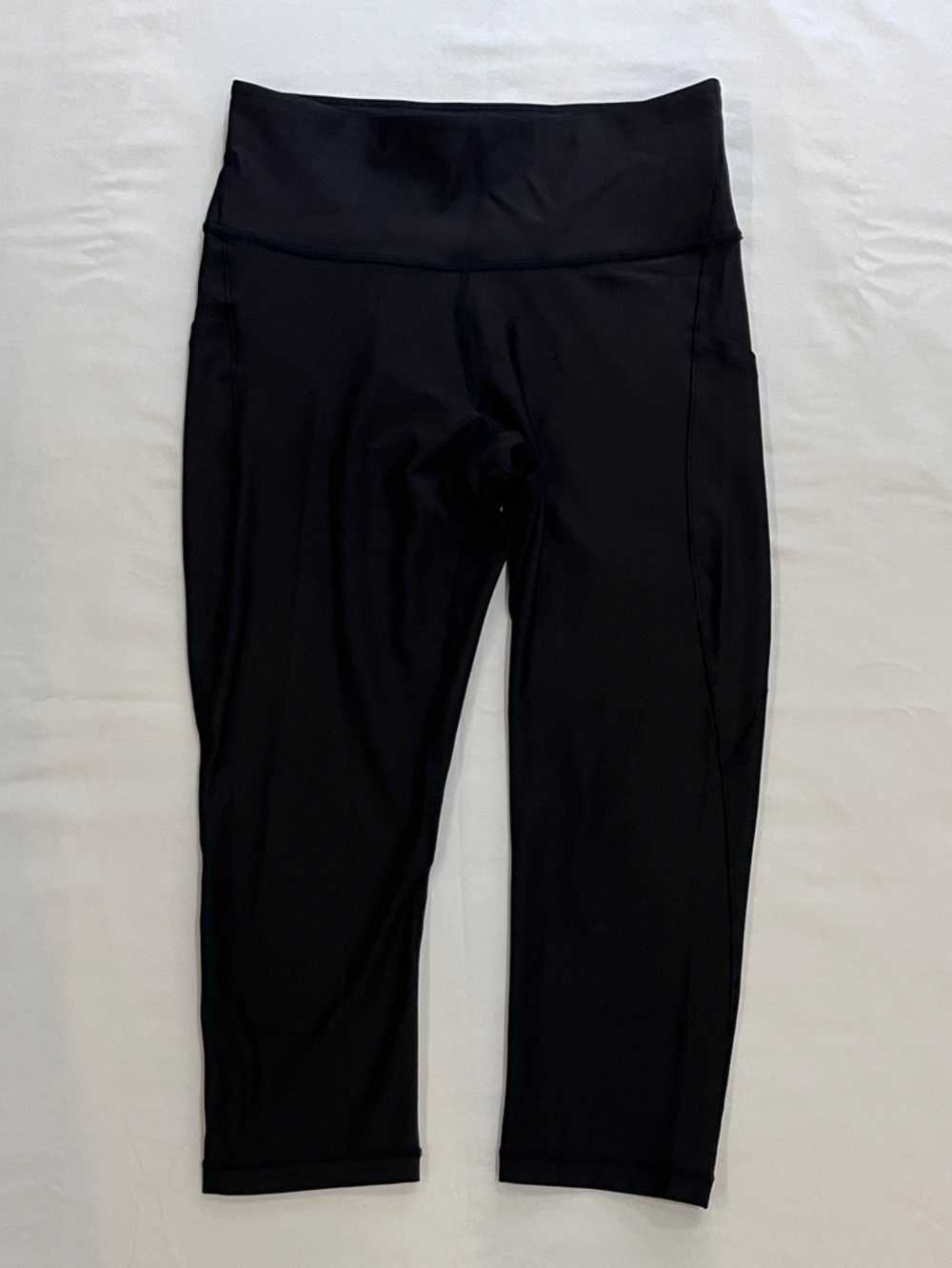 Athleta Interval Stash Black High-Rise Performance Crop leggings